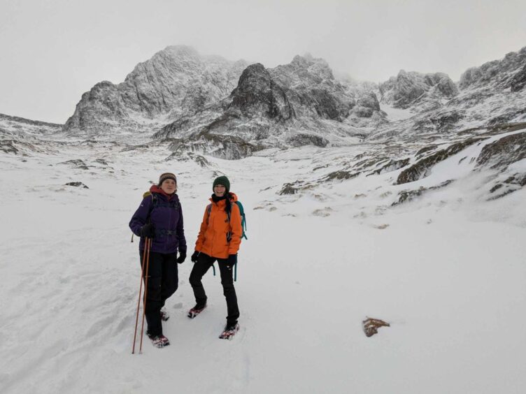 Hannah and Gayle pose for photos in the shadow of Ben Nevis. 