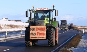 Tractor on the road to Aberdeen.