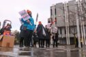 Council staff protested outside Marischal College and Aberdeen Town House in 2024. Image: Darrell Benns/DC Thomson