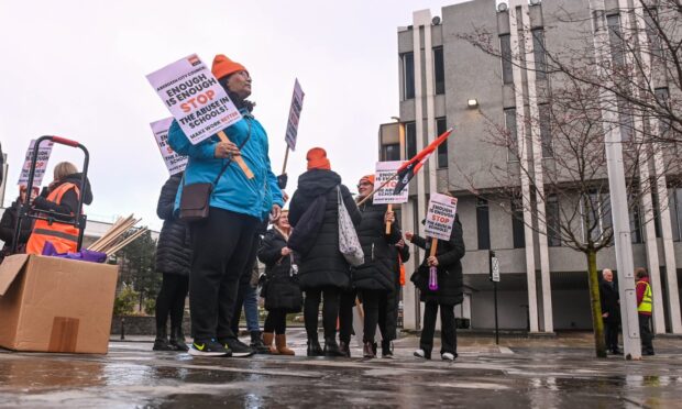 Council staff protested outside Marischal College and Aberdeen Town House in 2024. Image: Darrell Benns/DC Thomson