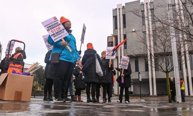 Council staff protested outside Marischal College and Aberdeen Town House in 2024. Image: Darrell Benns/DC Thomson