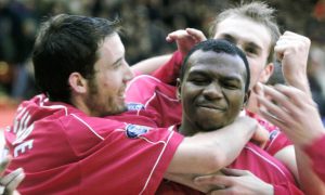 Leon Mike celebrates his equaliser with a delighted Russell Anderson and Phil McGuire.