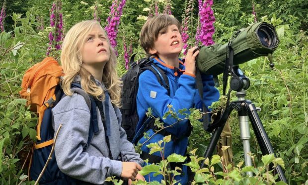 Harry (left) and Ollie Ferguson have completed 473 adventures - both local and global - during an action-packed childhood.