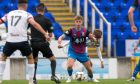 Inverness Caledonian Thistle defender Keith Bray looks for a pass during his team's SPFL League One match against Montrose at the Caledonian Stadium, Inverness, on August 17, 2024.