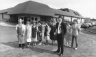 1987: Gary Butchart, front, manager of William Low's, Inverurie, outside the new supermarket with staff members. From left: Charles Smith, June Boddie, Evelyn Burns, Valerie Souter, Lucy Fraser, Dorothy Duguid, Lorna Burns and deputy manager Cameron Munro. Image: DC Thomson