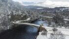 Craigellachie Bridge covered in snow