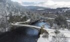 Craigellachie Bridge covered in snow