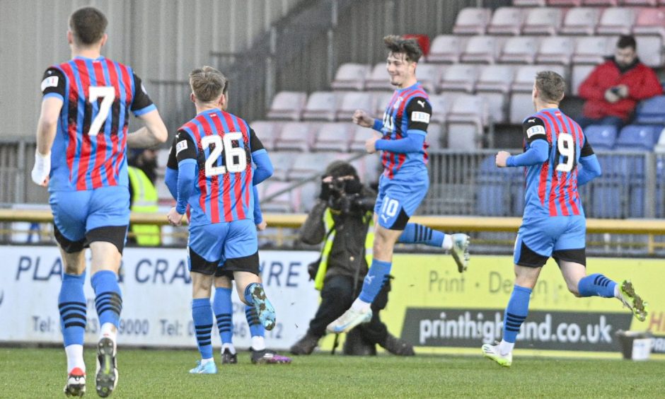 Alfie Bavidge rises to celebrate his goal in the 2-0 Caley Thistle win over Dumbarton on January 4, 2025, at the Caledonian Stadium, Inverness.