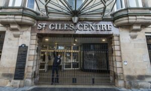 St Giles Centre getting locked up after closure.  Image: Jason Hedges/DC Thomson