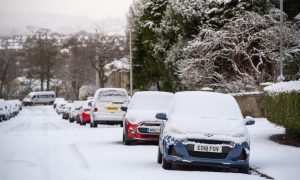 Snow continues to impact travel. Image: Kenny Elrick/DC Thomson