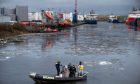 The search started in the River Dee but has been expanded into the harbour mouth. Image: Kenny Elrick/DC Thomson.