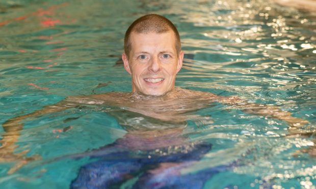 Scott Gray, pictured in the swimming pool at Ellon Community Campus, says learning to swim has changed his life.