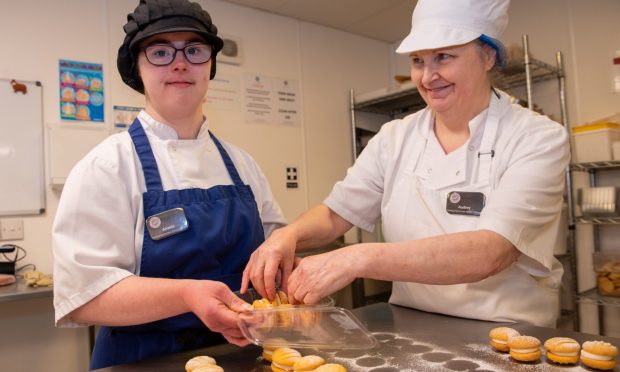 Fly Cup cafe trainee Amelia with staff member Audrey Massie in Inverurie. Image: Kami Thomson/DC Thomson