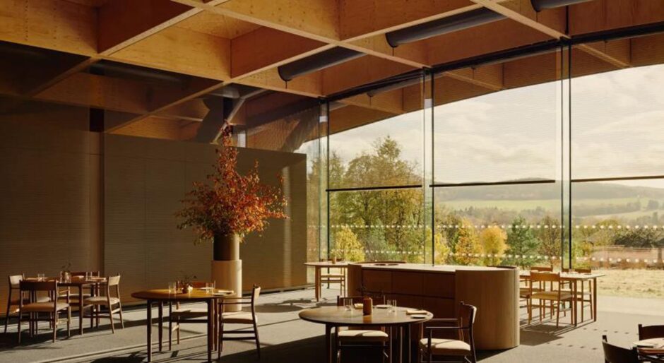 The interior of the restaurant. Seating area looks out to the countryside.