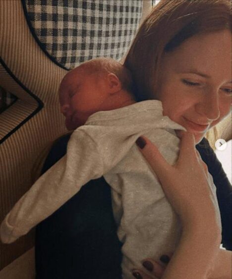 Karen Gillan holds baby Clementin