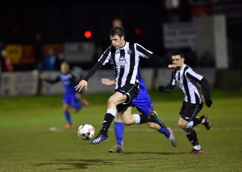 Ryan Sargent, left, and Scott Barbour on the attack for Fraserburgh against Huntly in the Highland League in February 2020.