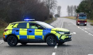 Police car blocks the A9 as fire engine heads northbound.