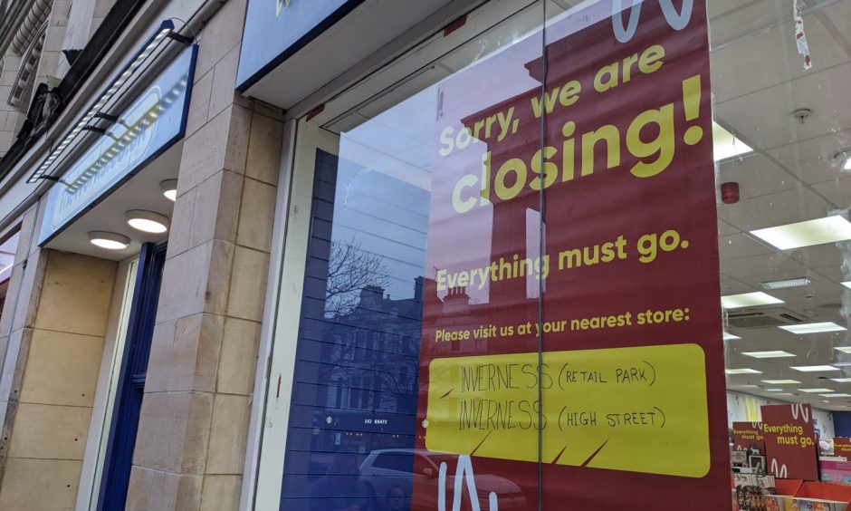 Closing signs outside The Works in Elgin.