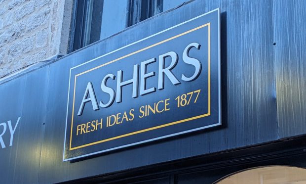 Ashers sign on shop.