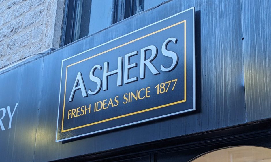 Ashers sign on shop.