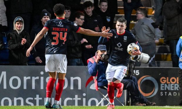 George Robesten congratulates Ronan Hale on his goal for Ross County. Image: SNS