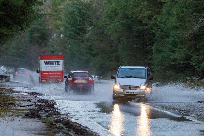 more flooding on the A96. Cars struggling to get pass the flooding