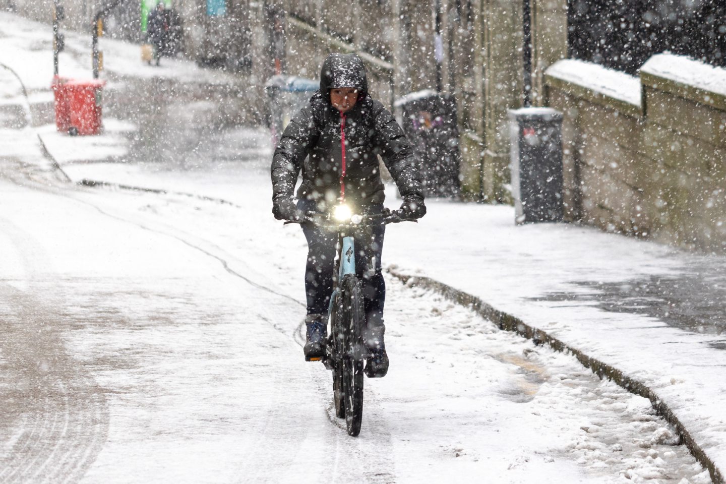 Cyclist in snow.