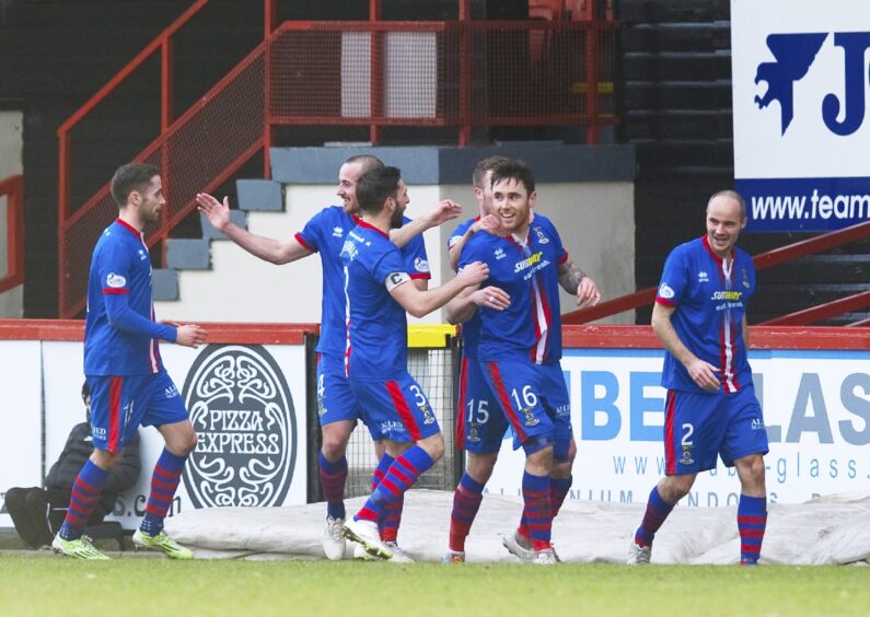 Inverness Caledonian Thistle midfielder Greg Tansey, centre, celebrates his goal in his team's 2-1 win at Partick Thistle's Firhill Stadium, Glasgow, in the fifth round of the William Hill Scottish Cup on Saturday, February 7, 2015. 