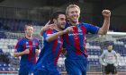 Dani Sanchez, left, with Richie Foran celebrates an Inverness Caledonian Thistle goal at home to Hamilton Academicals on January 22, 2011 in the SPL at the Caledonian Stadium, Inverness. Striker Adam Rooney is in the background.