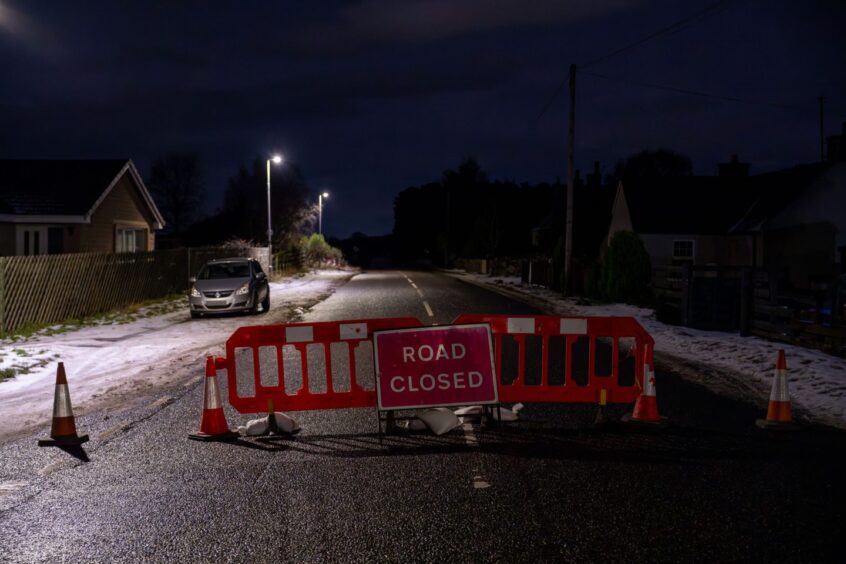 Road closed sign on B9013