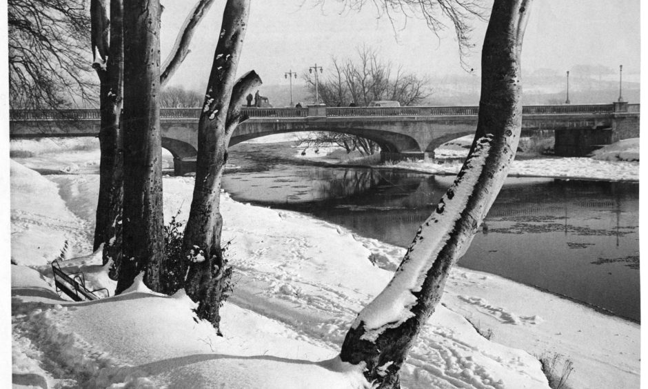 1969: The beauty of winter is shown in the path alongside the River Don at Inverurie looking towards the bridge, which was still the main Aberdeen to Inverness road in the 1960s. Image: DC Thomson