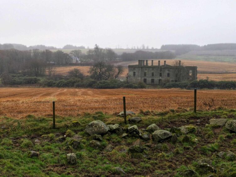 A view of Strichen House from the stone circle.