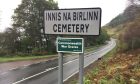 The sign at Na-Birlinn cemetery near Fort William. The smaller green sign below shows it is also a Commonwealth War Graves site.