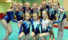 The City of Aberdeen Gymnastics Club pictured in 2010. Front row from left: Jane Davidson, Kate Cruickshank and Mia Mackenzie. Back row:  Carmen Neat, Ciara Stenhouse, Victoria Cockburn, Saoirse Stenhouse, Antonia Lawrence, Kim Beattie and Sophie Flett.