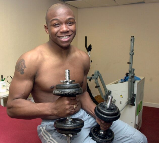 Leon Mike lifts weights in the gym at Pittodrie. 