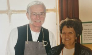 Ernie Reid - in his traditional apron, with wife Chris.