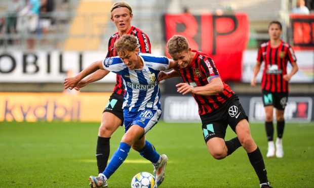 Alexander Jensen, centre with head band, in action for Brommapojkarna against Gothenburg.