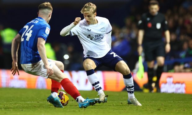 Jeppe Okkels of Preston North End. battles for the ball against Portsmouth.