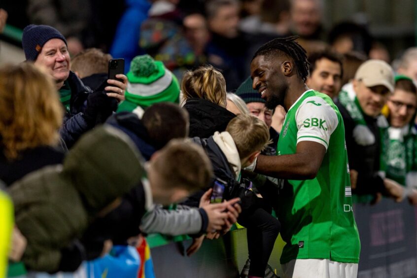 Rocky Bushiri of Hibernian at full-time after their win over Aberdeen on Saturday. Image: Shutterstock.