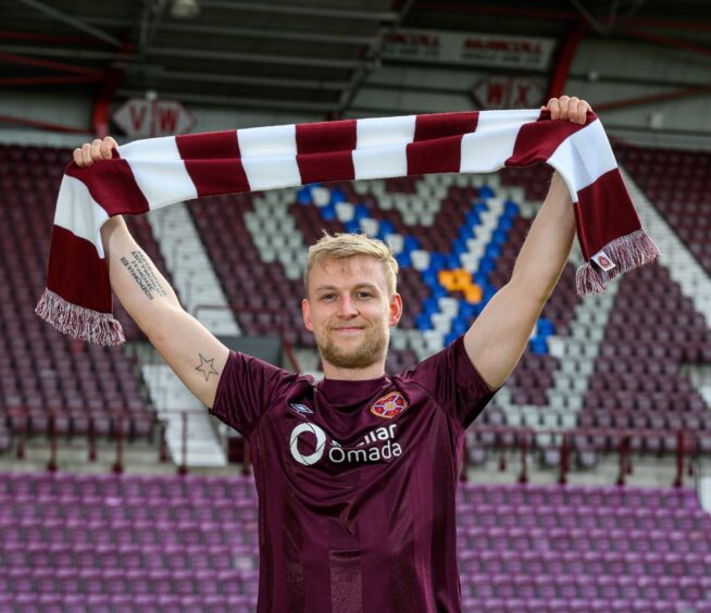 Harry Milne signing on transfer deadline day for Heart of Midlothian at Tynecastle Park, Edinburgh. Image: Shutterstock.