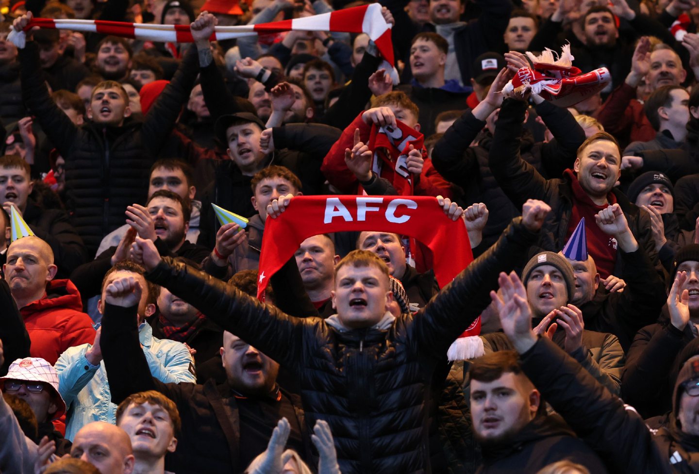 Aberdeen supporters cheer on their team in the 2-1 win against Dundee at Dens Park. Image: Shutterstock 