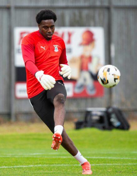 Inverness Caledonian Thistle goalkeeper Musa Dibaga kicking the ball during a pre-match warm-up ahead of his side's SPFL League One match at Dumbarton on October 26, 2024. 