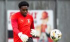 Inverness Caledonian Thistle goalkeeper Musa Dibaga kicks the ball during a warm-up routine Dumbarton on October 26, 2024.