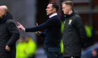 Ross County manager Don Cowie gives out instructions to his players on the touchline during a match against Rangers at Ibrox.