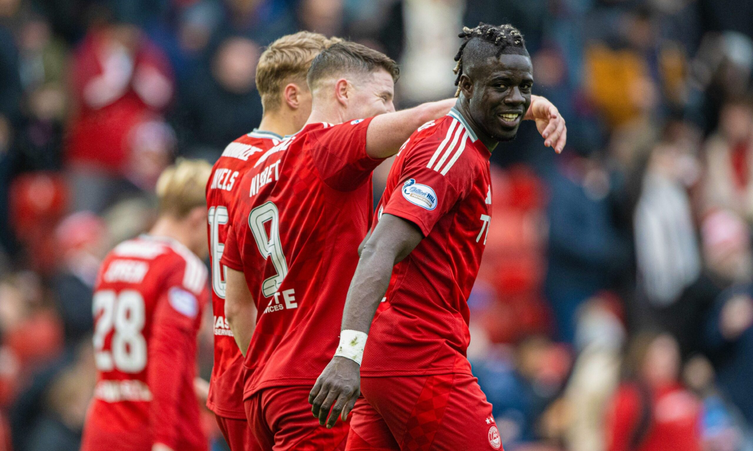 Aberdeen's Pape Habib Gueye celebrates scoring to make it 1-0 against Dunfermline. Image: SNS.