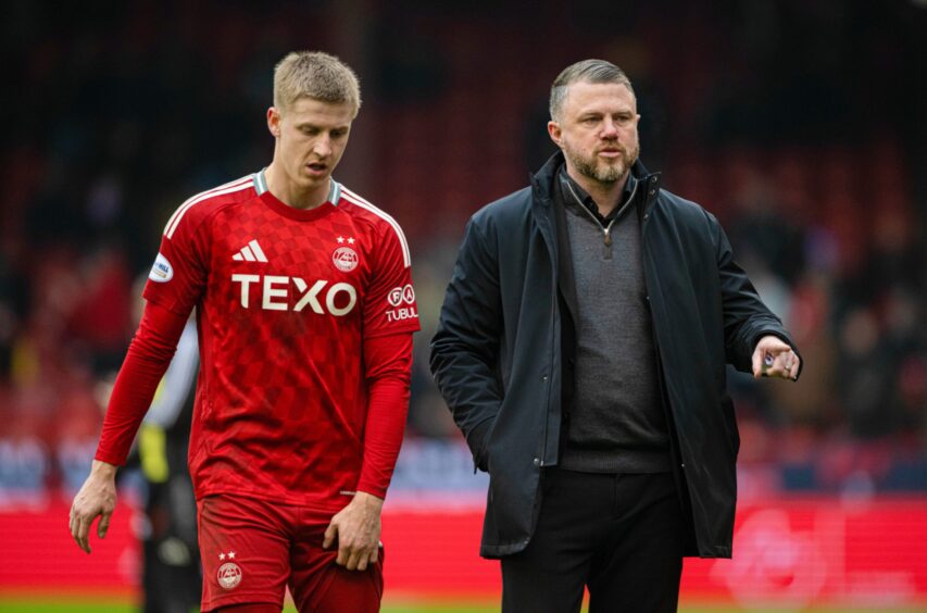 Aberdeen head coach Jimmy Thelin with Mats Knoester after the Scottish Cup win over Dunfermline Athletic. Image: SNS.