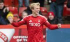 Aberdeen's Alexander Jensen celebrates scoring to make it 2-0 against Dunfermline at Pittodrie. Image: SNS.