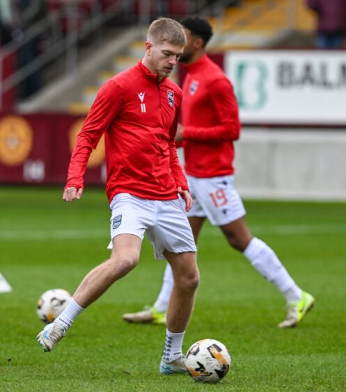 Ross County forward Kieran Phillips during a pre-match warm-up ahead of his team's SPFL Premiership fixture against Motherwell at Fir Park Stadium on February 15, 2025. 