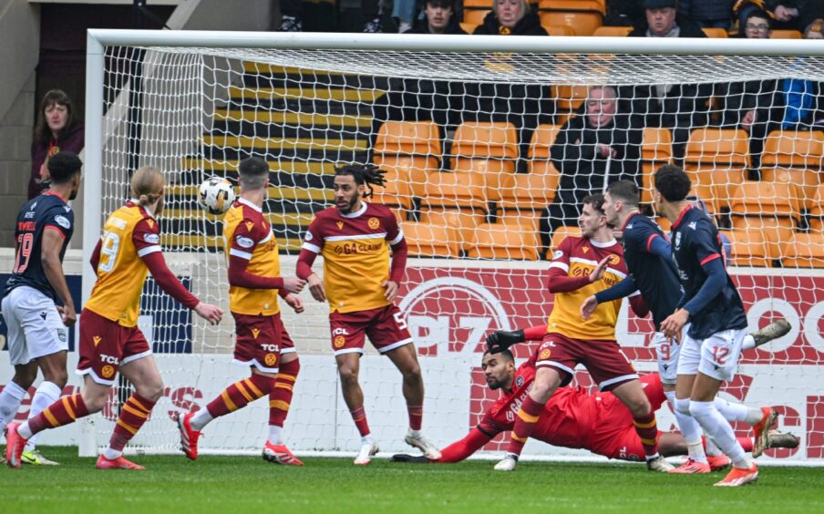 Ross County's Jonathan Tomkinson (number 12) watches his volley blocked on the way to goal against Motherwell at Fir Park Stadium, Motherwell, on February 15, 2025, in this SPFL Premiership match. 