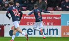 Ross County striker Ronan Hale (number nine) races off to celebrate after opening the scoring against Motherwell in the SPFL Premiership match at Fir Park Stadium, Motherwell, on February 15, 2025.